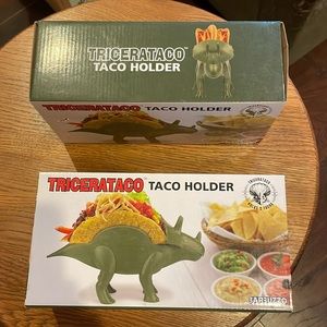 Tricerataco Taco Holder. Set of two. In box. Each dinosaur holds two tacos.